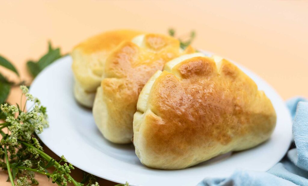 Freshly baked Japanese Cream Pan with homemade custard cream filling.